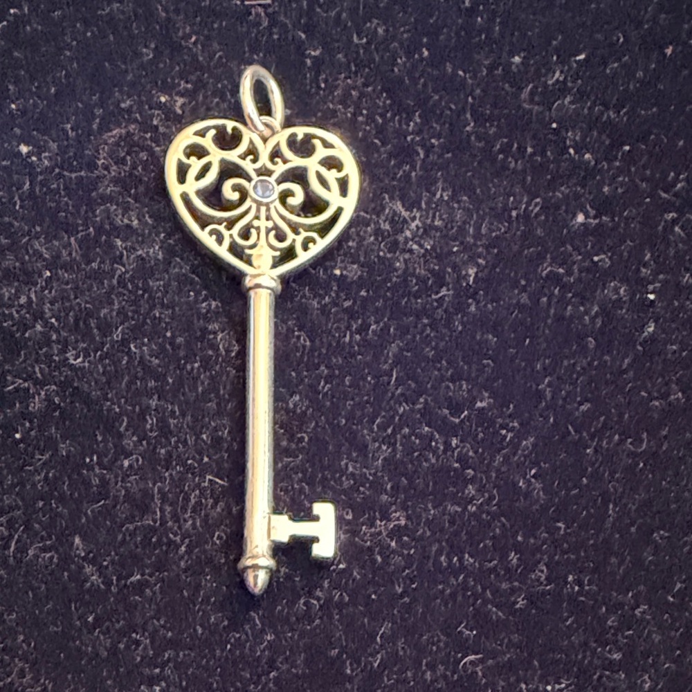 Tiffany Sterling silver Heart Key Pendant with sapphire stone